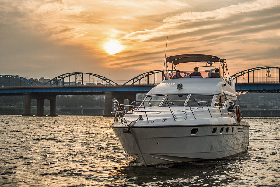 A picture of a yacht on the Hangang River with a one-more trip logo